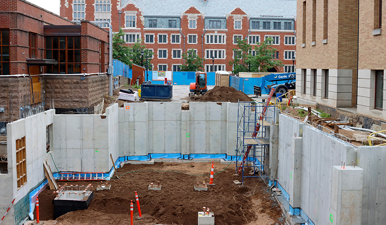 Concrete foundation of the new Economics Building facing west, August 2021, photo by Ronnie Rysz