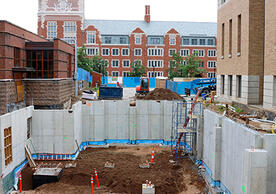 Concrete foundation of the new Economics Building facing west, photo by Ronnie Rysz