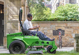 Facilities grounds and maintenance mowing on campus, photo by Robert DeSanto