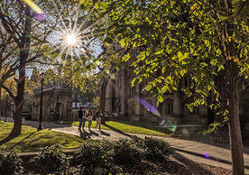 Yale students walking on Central Campus, photo by Dan Renzetti.